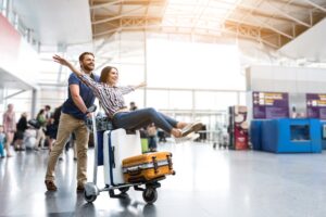 happy couple at the airport